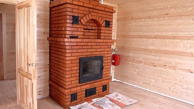Каменная печь-камин с встроенным теплообменником